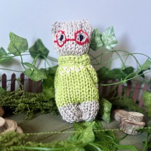 handmade knitted pocket cat with glasses